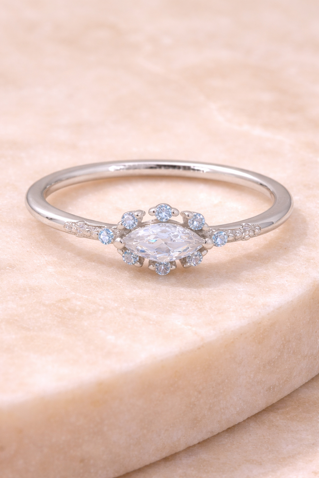 Sterling silver with rhodium, 5x10mm cubic zirconia eye ring, 1.5mm band