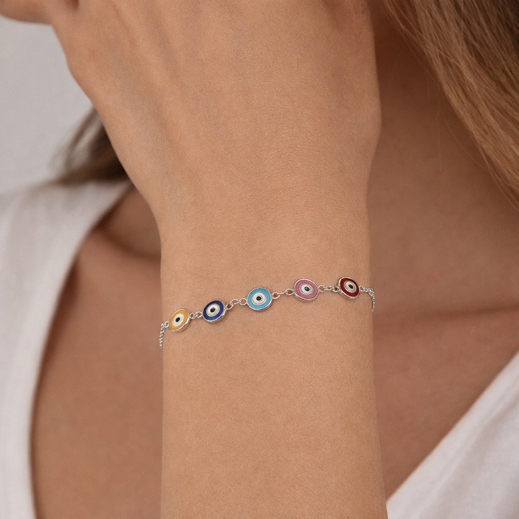 Sterling silver with rhodium, 7mm evil eye charm bracelet, 7″ + 1″ extension