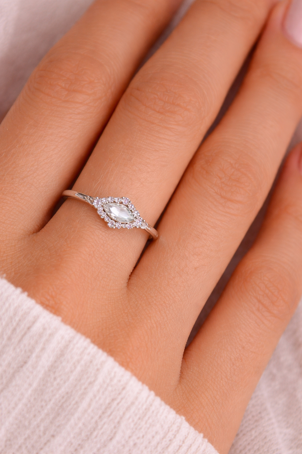 Sterling silver with rhodium, 5x10mm cubic zirconia eye ring, 1.5mm band