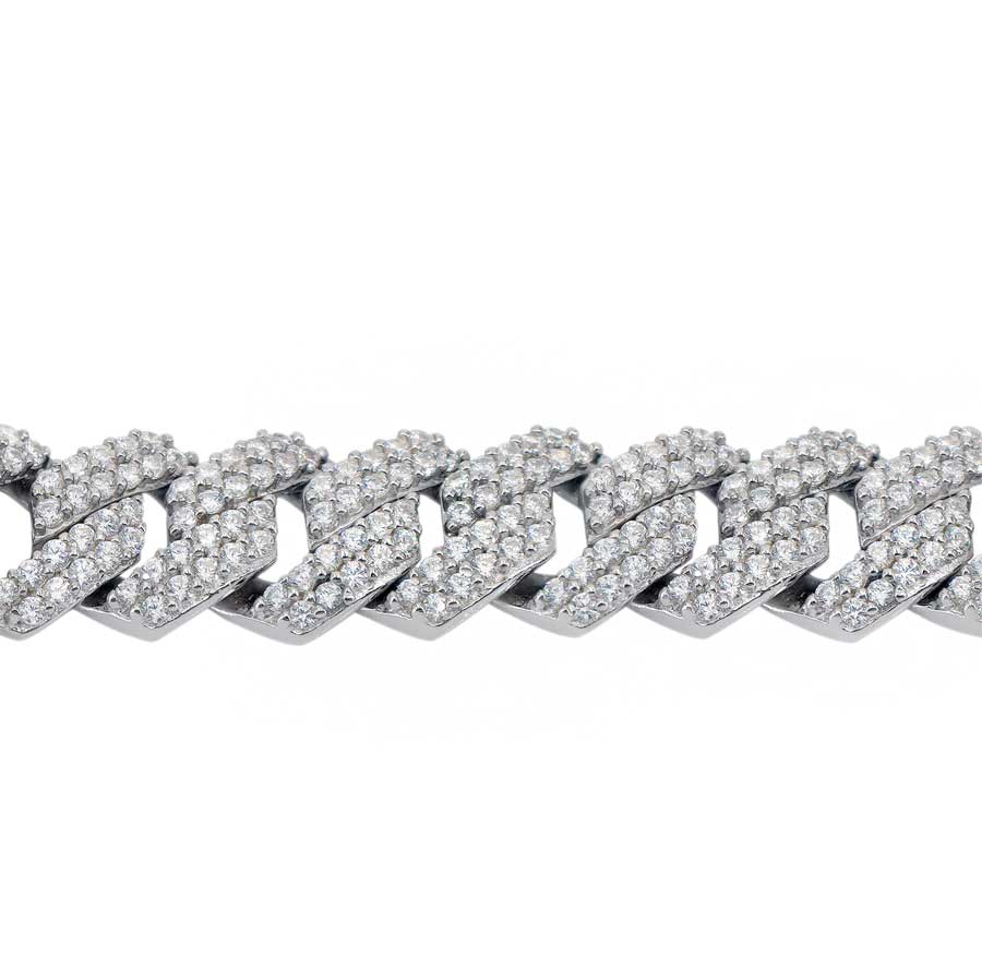 Sterling silver with rhodium, zig zag Cuban bracelet with cubic zirconia.